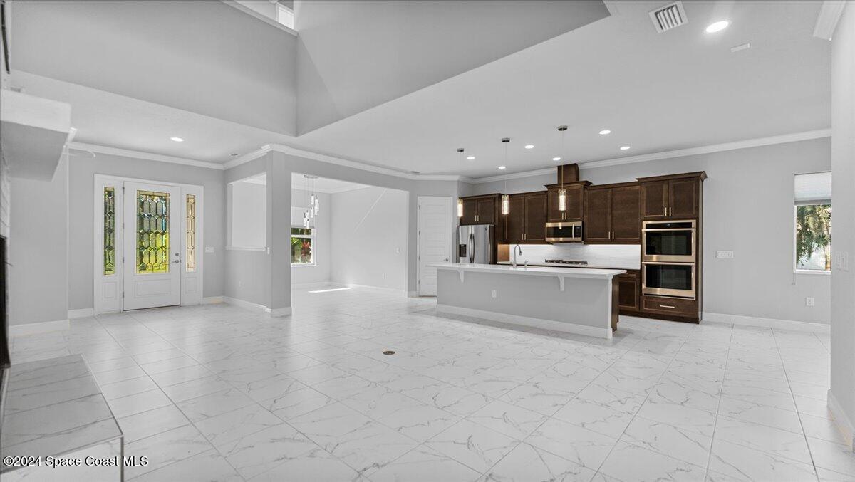 1016 Gray Road Cocoa, FL 32926 - Photo 18 of 59 16-Living to Kitchen