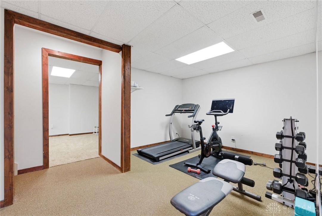 1540 Jasper Road Xenia, OH 45385 - Photo 46 of 91 An inviting exercise room features bright lighting and ample space for fitness equipment.