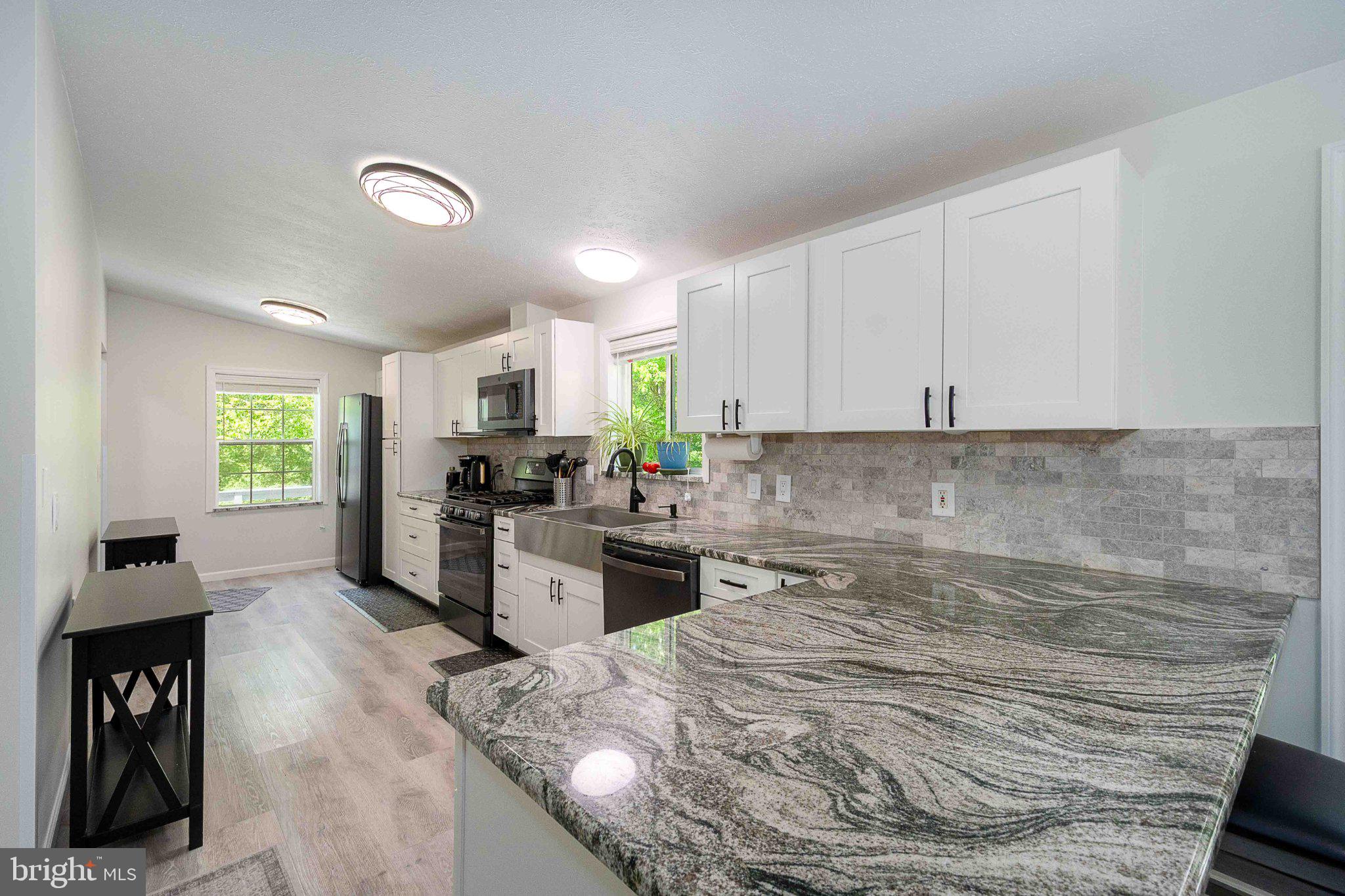 511 Hill Top Road Oakland, MD 21550 - Photo 17 of 51 Modern kitchen with sleek finishes.