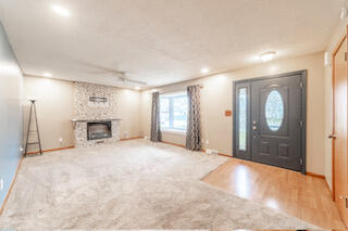 601 Post Street Wanatah, IN 46390 - Photo 12 of 37 a view of a livingroom with a fireplace