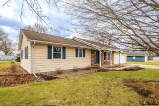601 Post Street Wanatah, IN 46390 - Photo 3 of 37 a front view of house with yard