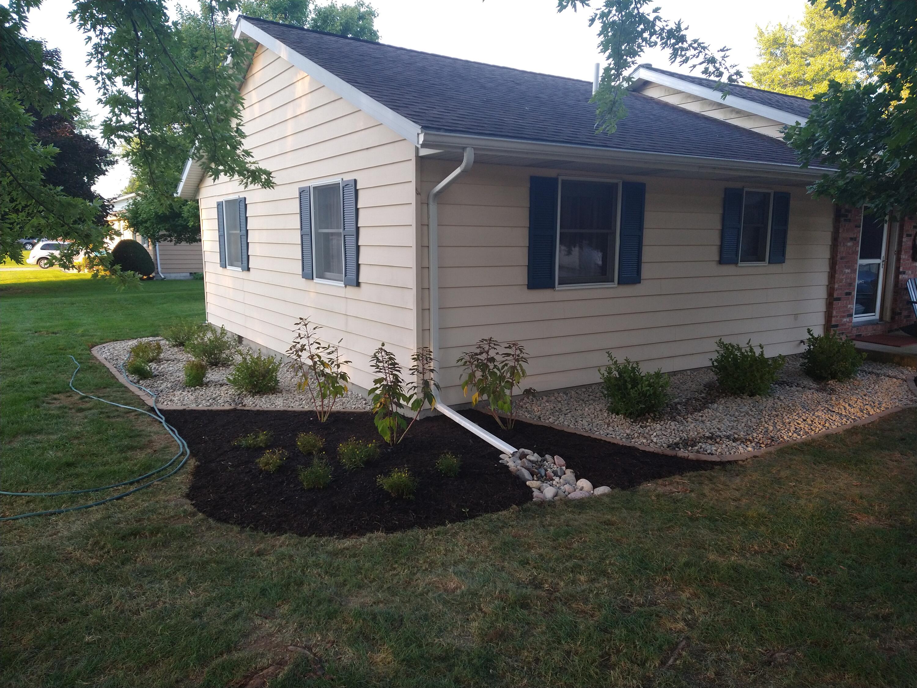 601 Post Street Wanatah, IN 46390 - Photo 37 of 37 a view of a small house with a yard