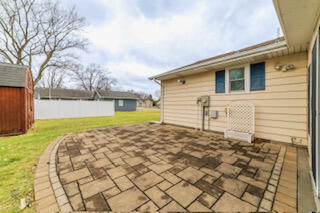 601 Post Street Wanatah, IN 46390 - Photo 9 of 37 a view of a backyard of the house