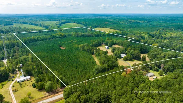 a kitchen with refrigerator and window