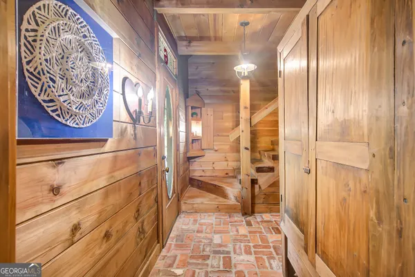 a bathroom with a sink a mirror and a shower