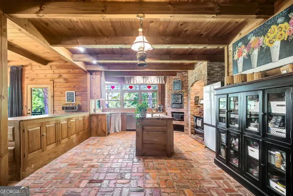 a view of a forest with a house