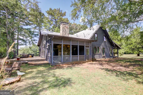 a bathroom with a glass door shower