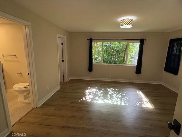 a view of an empty room and window