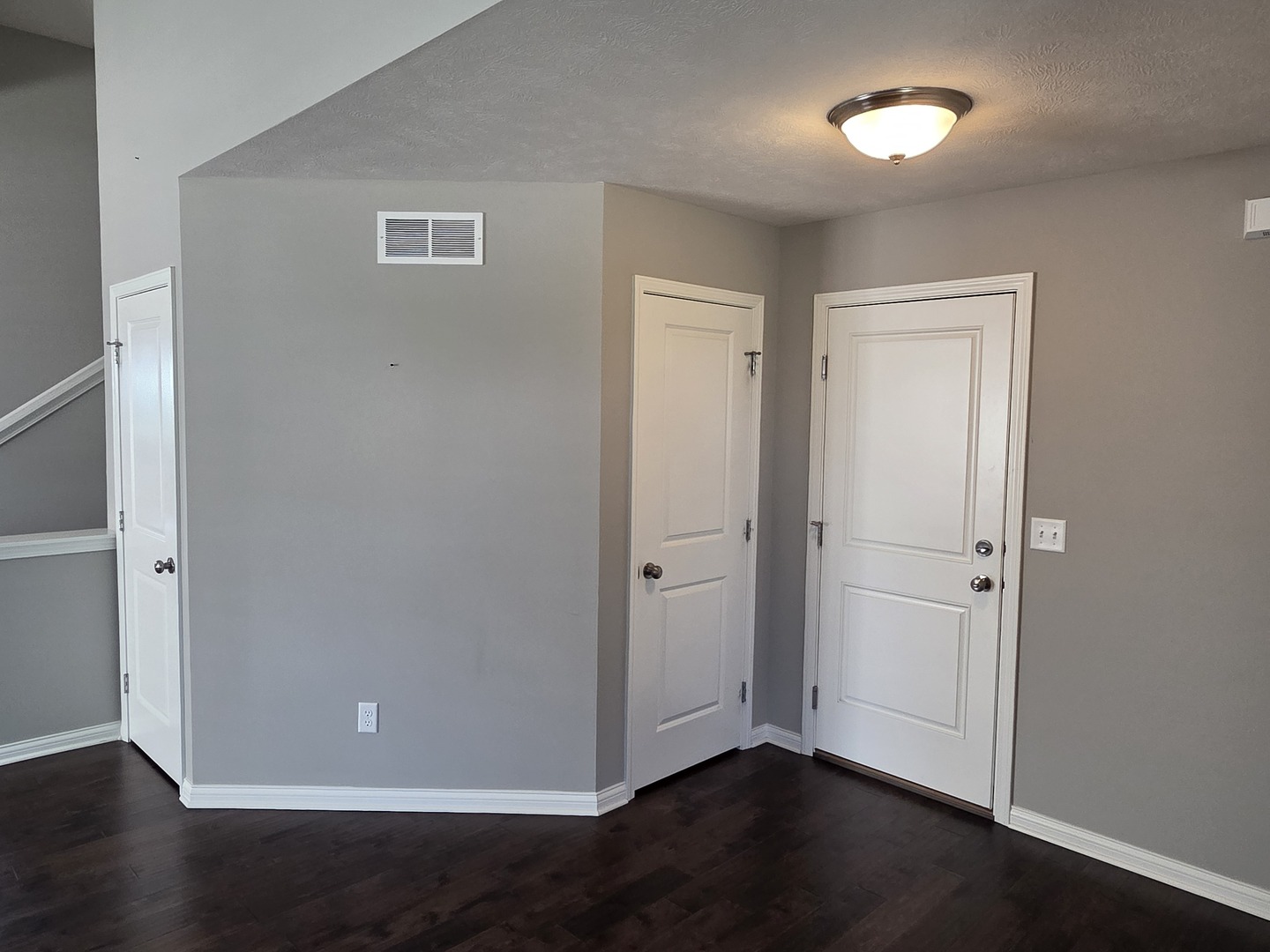 1036 Stags Leap Road Normal, IL 61761 - Photo 16 of 43 an empty room with wooden floor and closet
