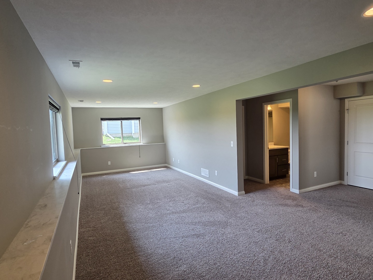 1036 Stags Leap Road Normal, IL 61761 - Photo 28 of 43 an empty room with windows and closet