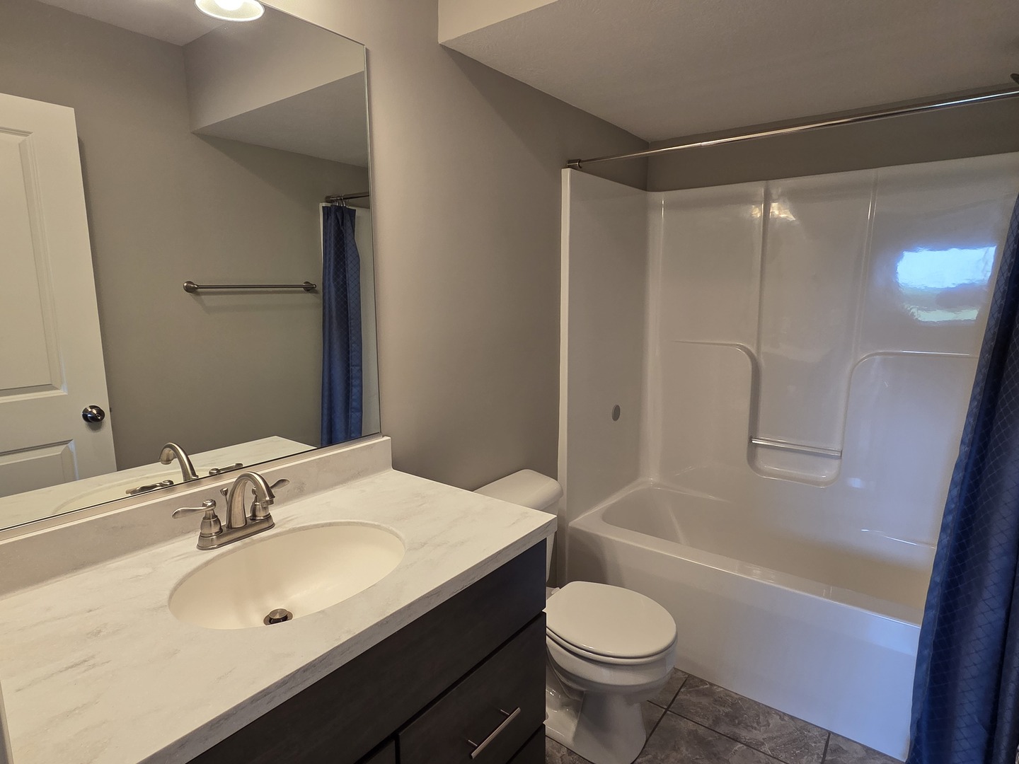 1036 Stags Leap Road Normal, IL 61761 - Photo 33 of 43 a bathroom with a sink toilet and shower