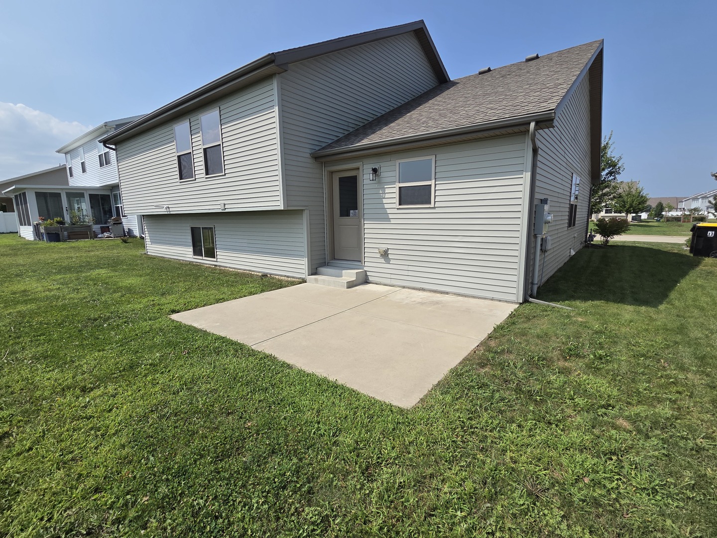 1036 Stags Leap Road Normal, IL 61761 - Photo 41 of 43 a front view of a house with a yard and garage