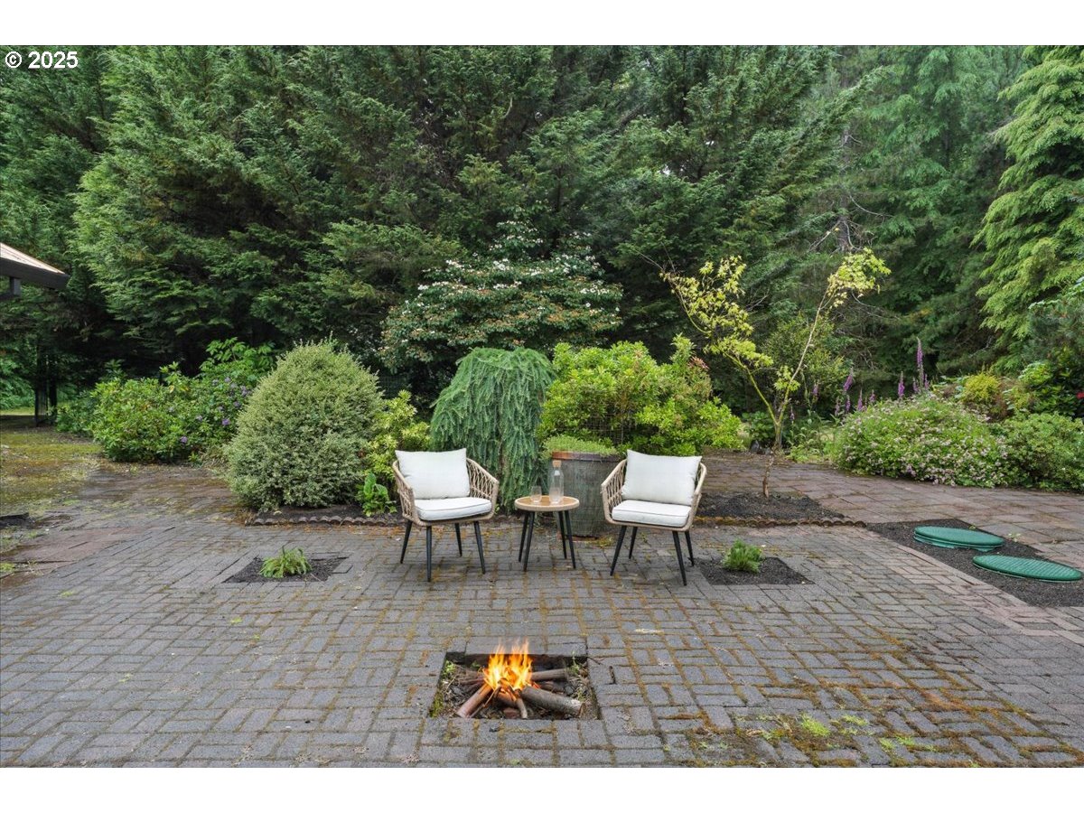 80487 Sha-NE-Mah Road Seaside, OR 97138 - Photo 43 of 48 a view of a backyard and patio