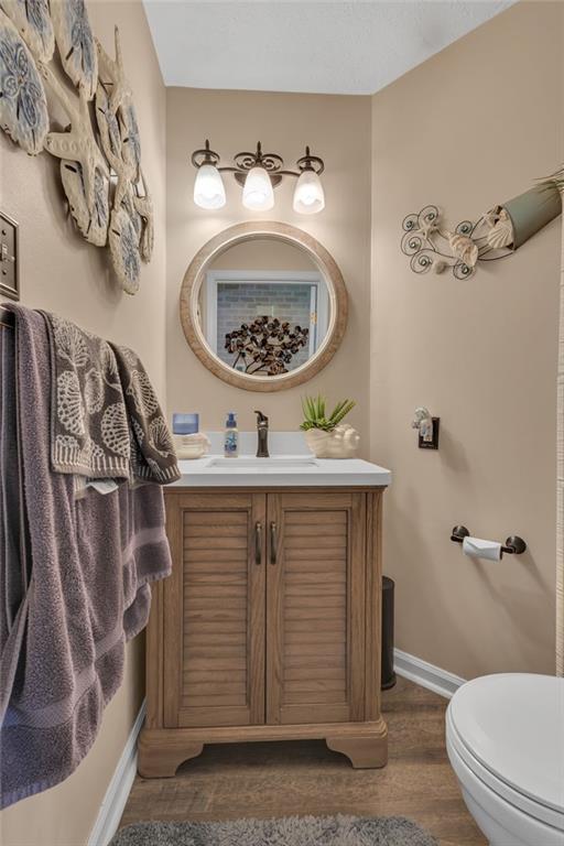 243 Edgewood Drive Beaver, PA 15009 - Photo 15 of 39 Main floor half bath has also been fully updated with vanity, lighting, high rise toilet and flooring.