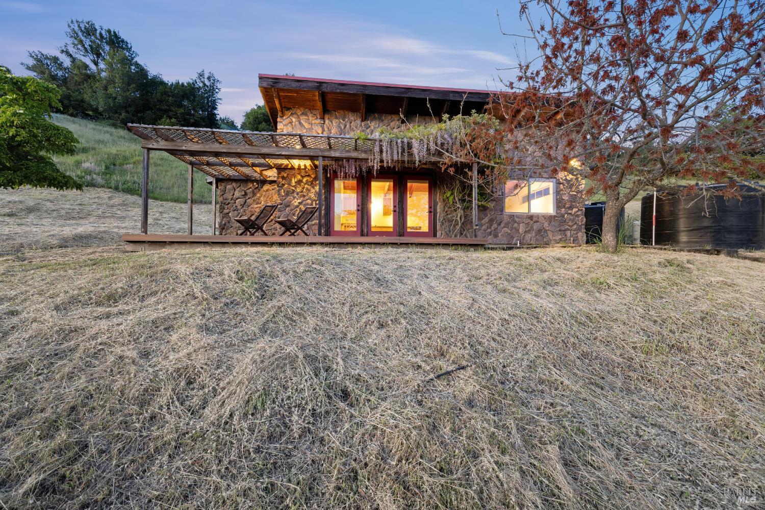 6960 Round Oak Road Penngrove, CA 94951 - Photo 34 of 58 a view of a house with a yard