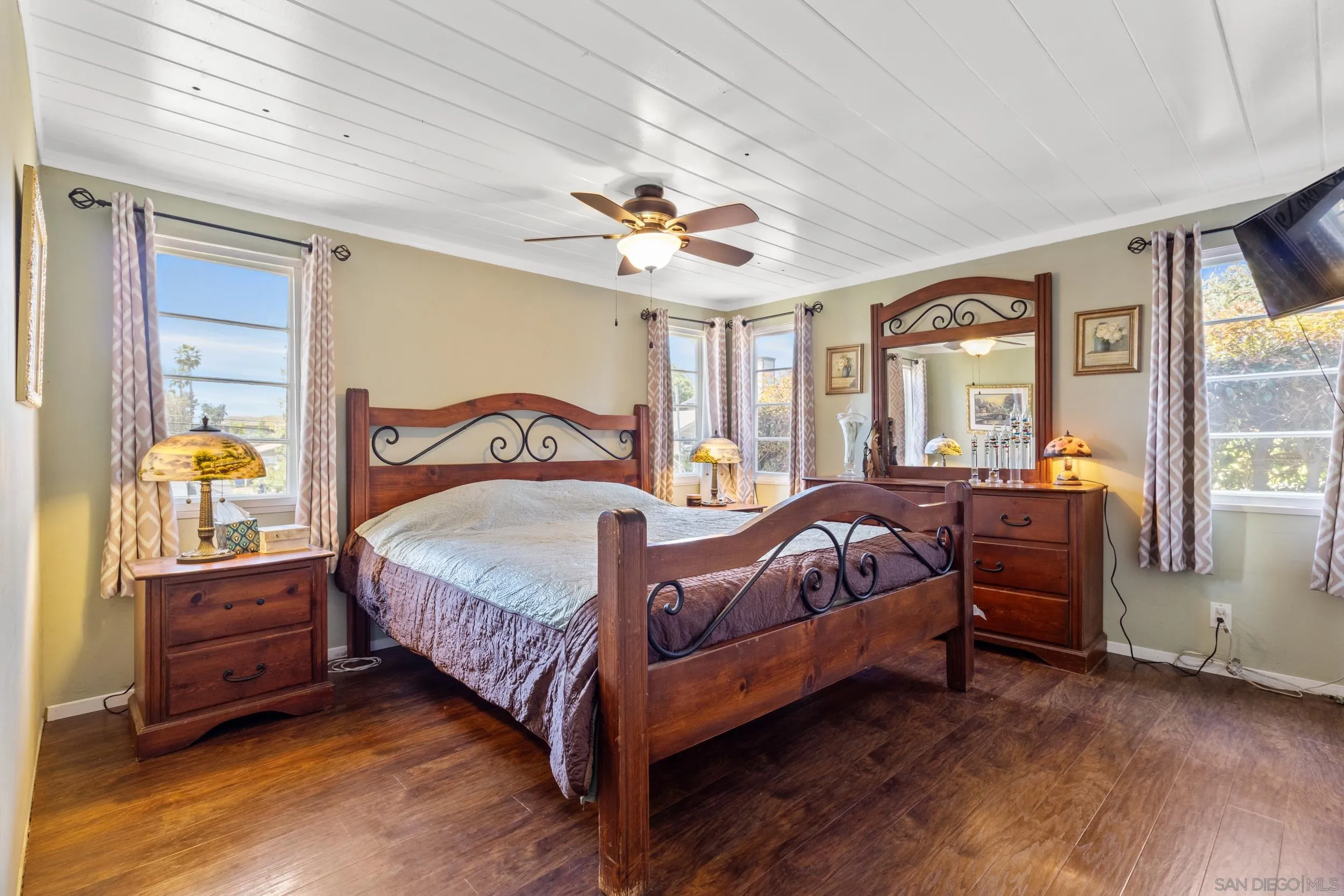 304 Palm Drive Vista, CA 92084 - Photo 15 of 32 a bedroom with a bed and window