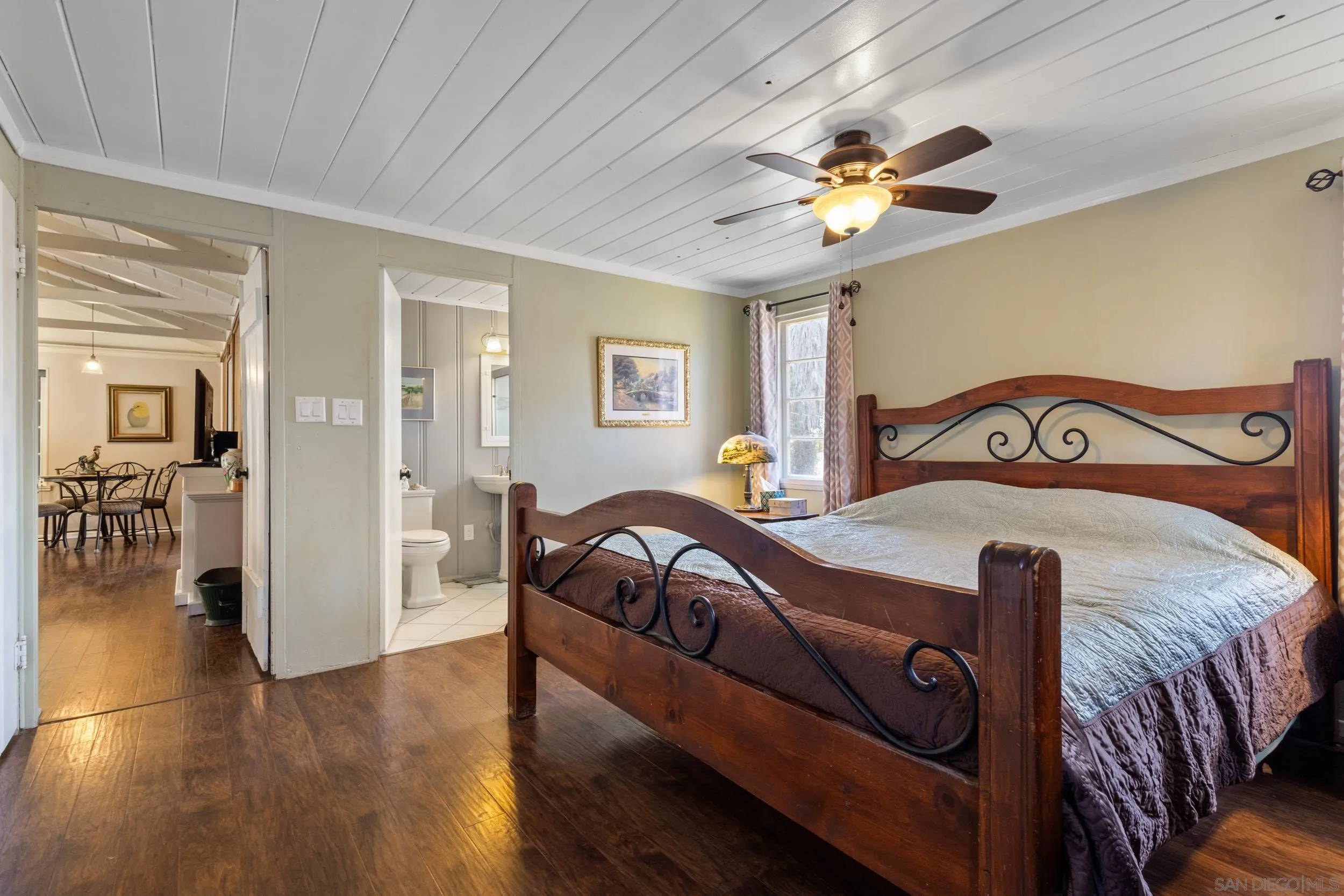 304 Palm Drive Vista, CA 92084 - Photo 16 of 32 a bedroom with furniture and wooden floor