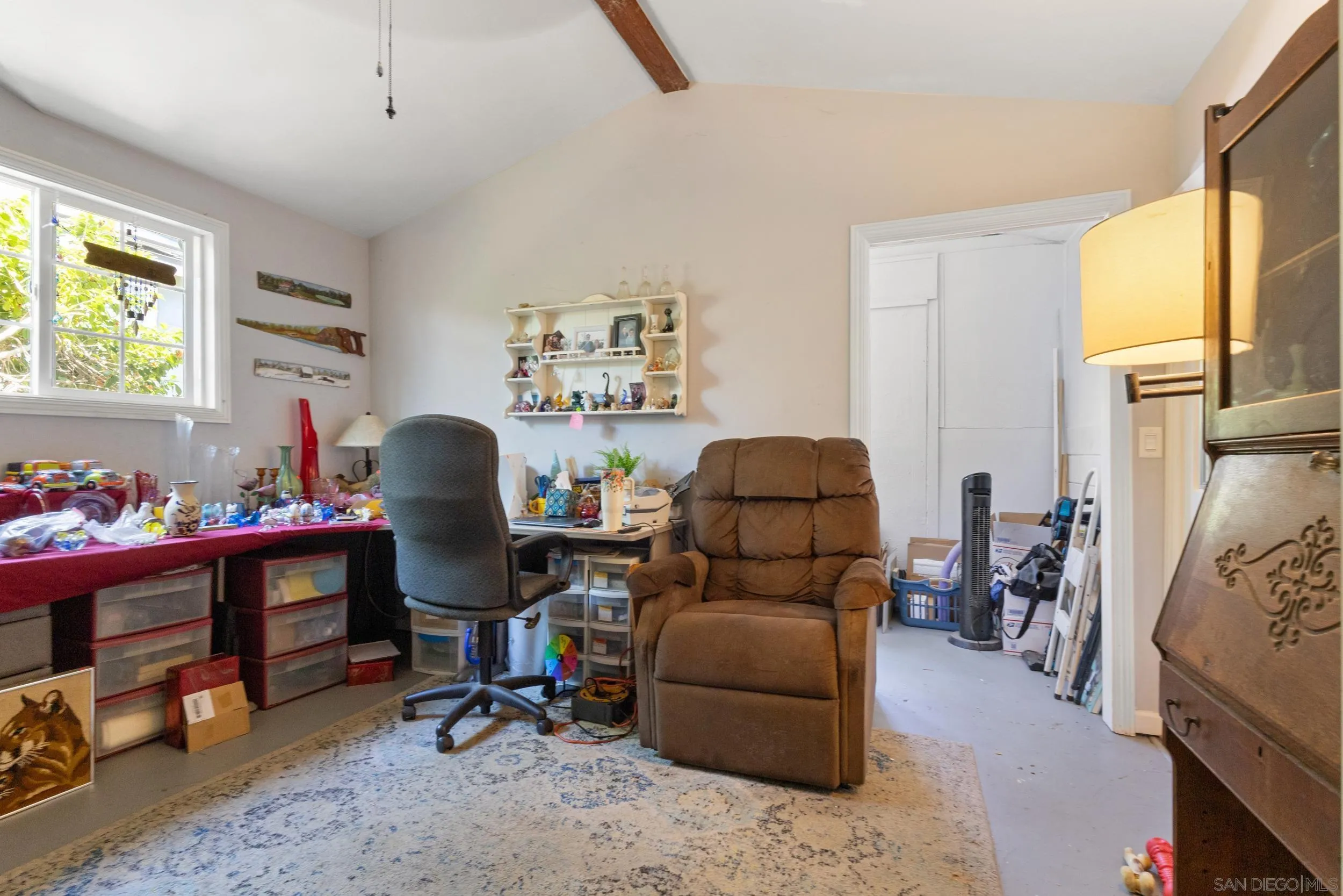 304 Palm Drive Vista, CA 92084 - Photo 19 of 32 a view of a workspace with furniture and a window