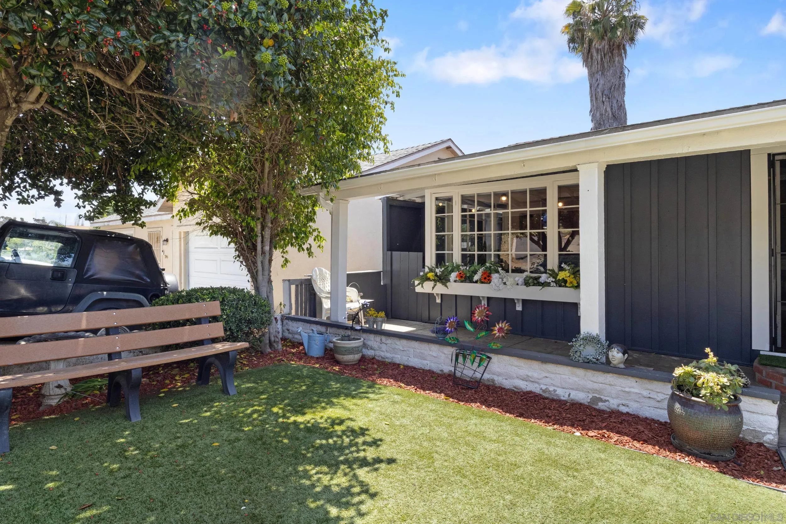 304 Palm Drive Vista, CA 92084 - Photo 24 of 32 a front view of a house with garden