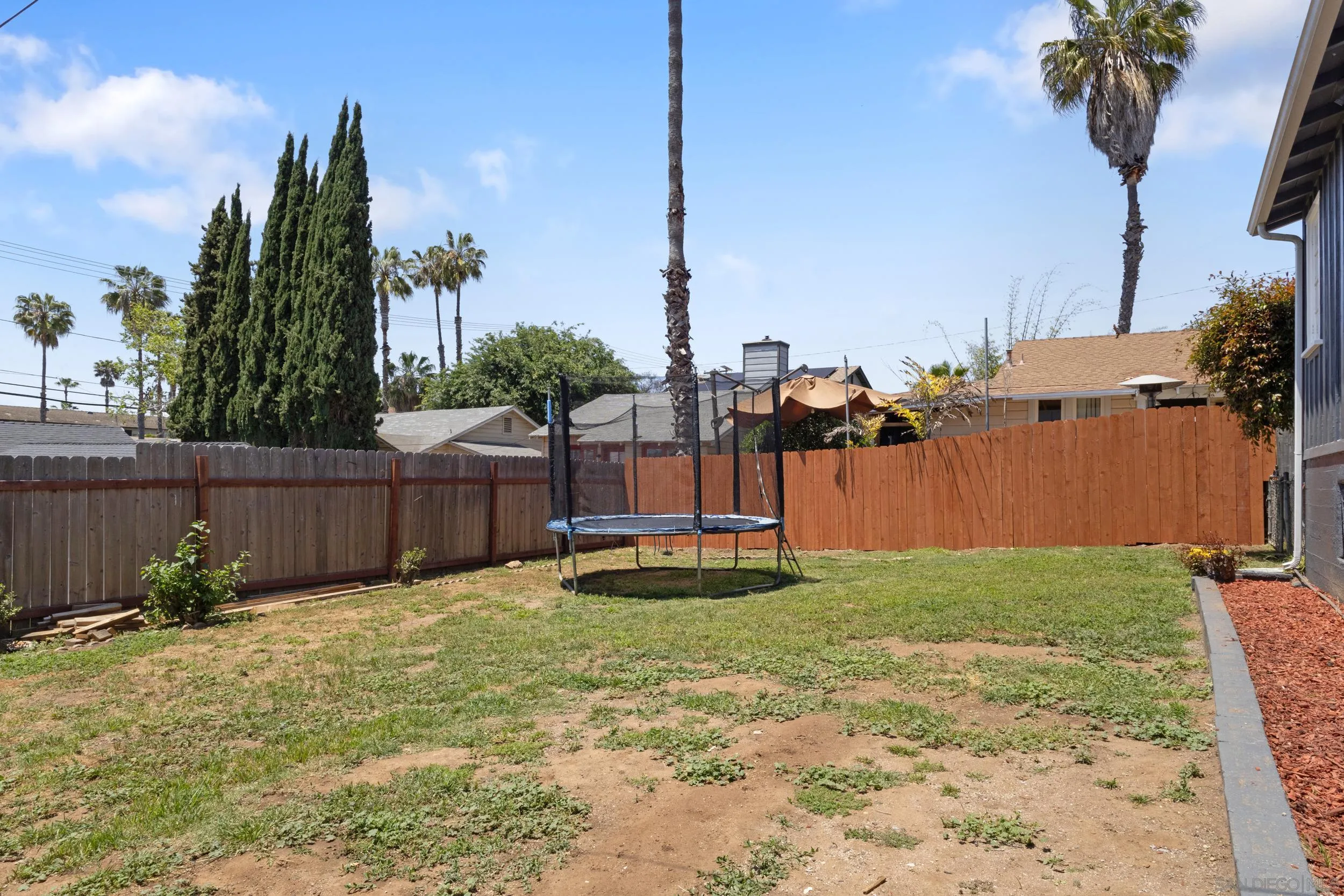 304 Palm Drive Vista, CA 92084 - Photo 27 of 32 a swimming pool with yard and lake view