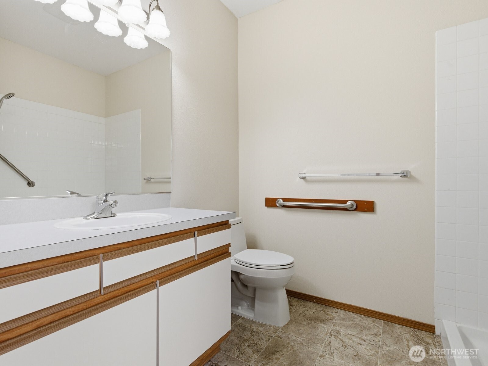 323 North Laventure Road, Unit C Mount Vernon, WA 98273 - Photo 17 of 24 a bathroom with a sink a toilet and vanity