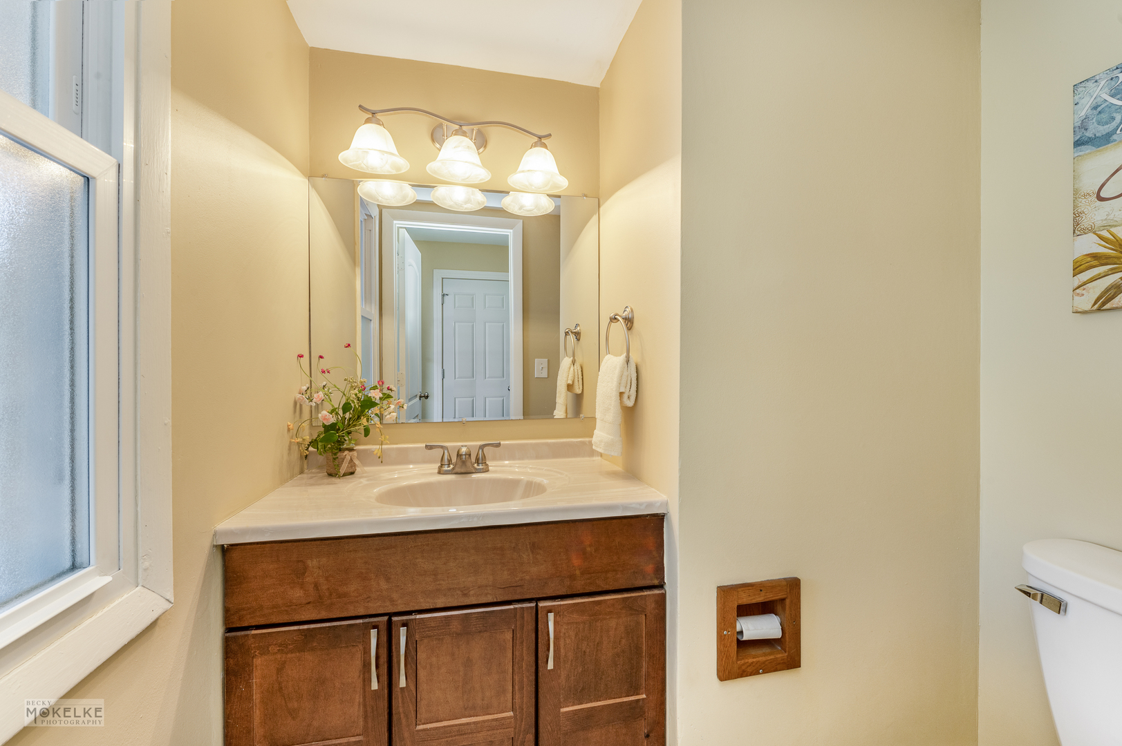 193 Jeffrey Lane Bolingbrook, IL 60440 - Photo 23 of 27 a bathroom with a sink and a mirror