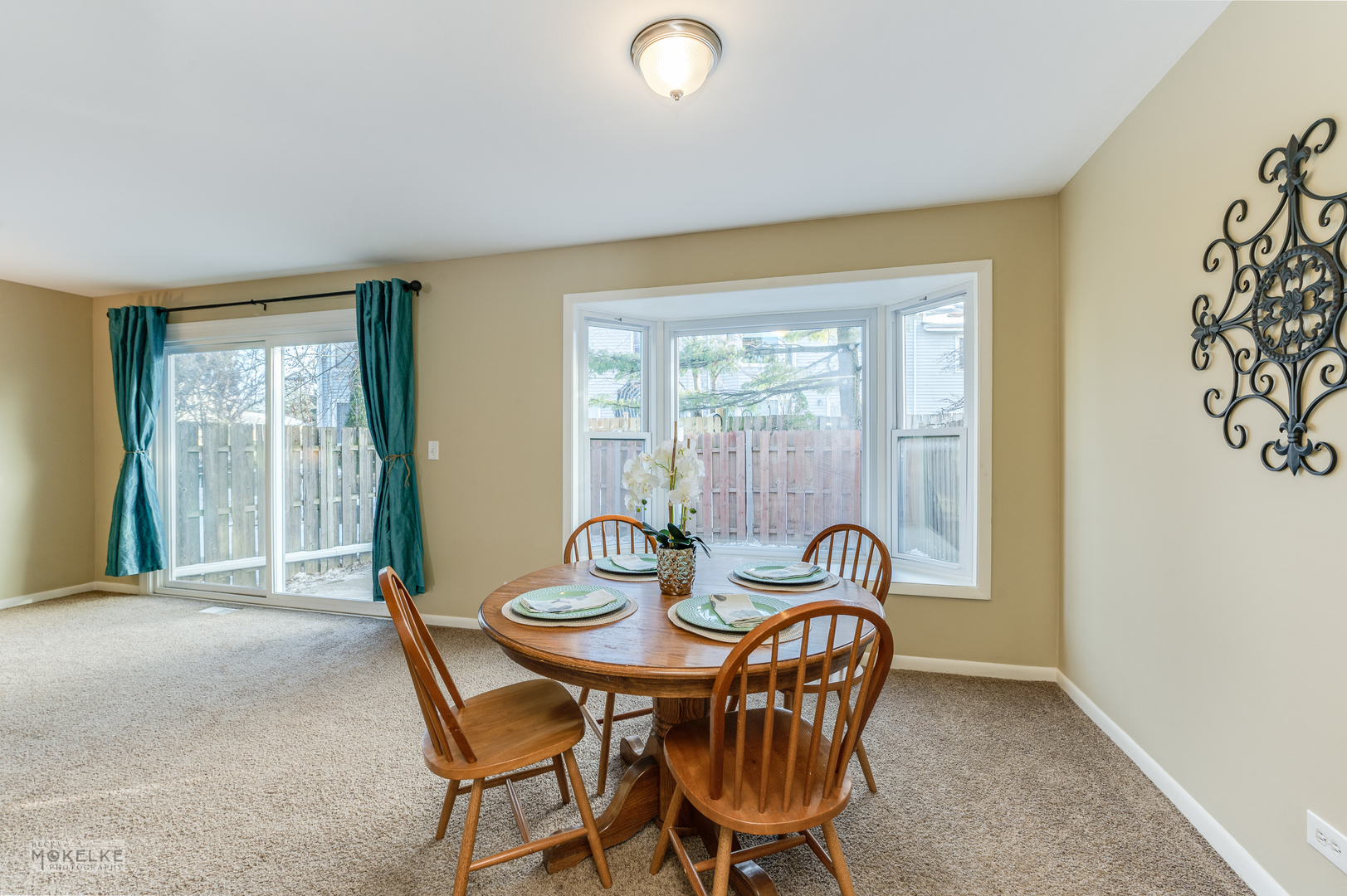 193 Jeffrey Lane Bolingbrook, IL 60440 - Photo 7 of 27 a view of a dining room with furniture and windows