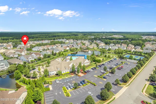 a living room with a fireplace and a fireplace