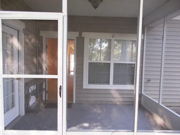 a view of outdoor space with sliding door