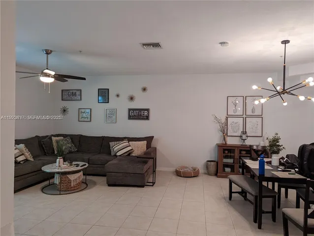 a view of a hallway with a furniture