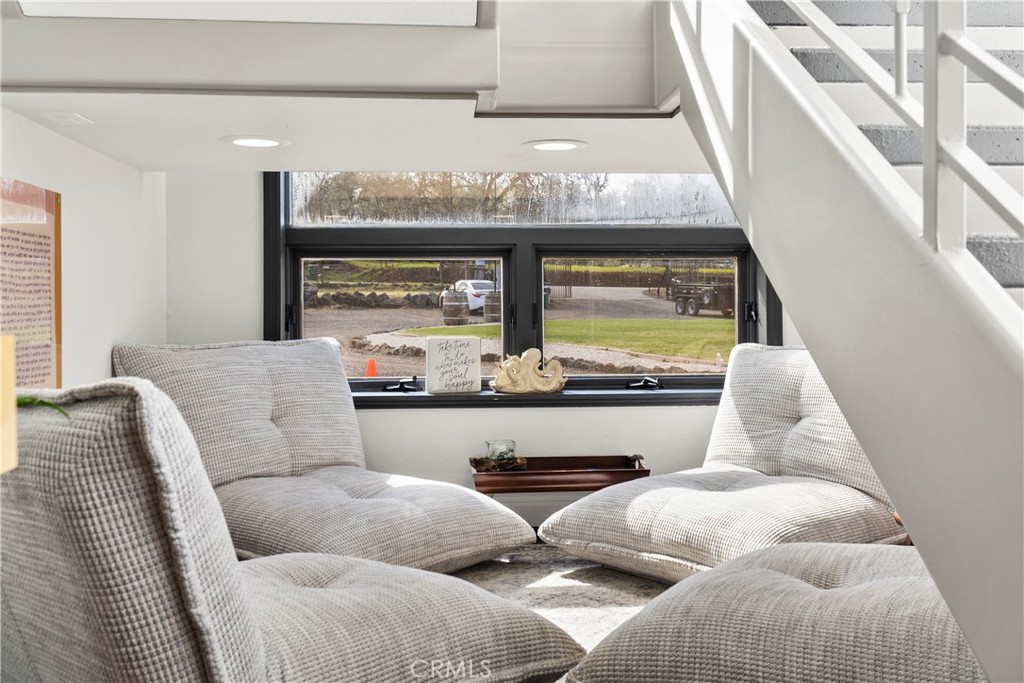 6237 Cohasset Road Chico, CA 95973 - Photo 27 of 73 cozy lounge under stairs