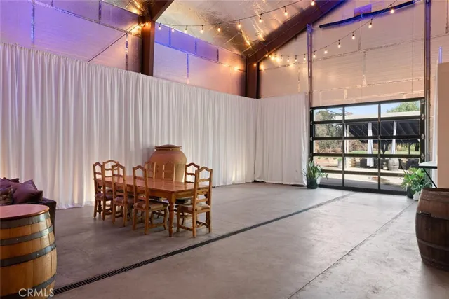 a kitchen with stainless steel appliances a stove and a refrigerator
