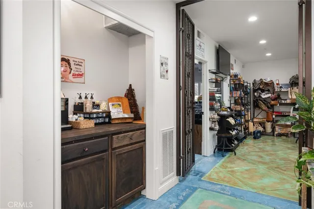 a bathroom with a sink a mirror and a shower