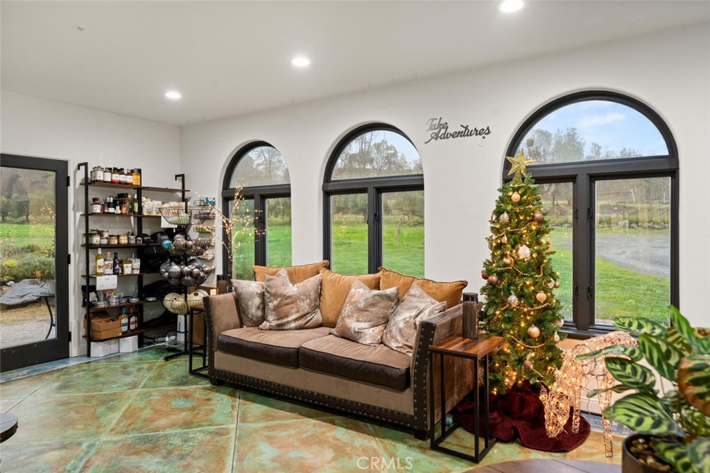 6237 Cohasset Road Chico, CA 95973 - Photo 46 of 73 a living room with furniture and a large window