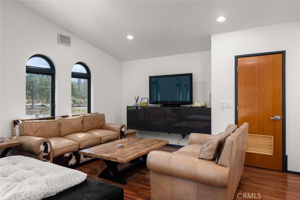 6237 Cohasset Road Chico, CA 95973 - Photo 56 of 73 a living room with furniture and a flat screen tv