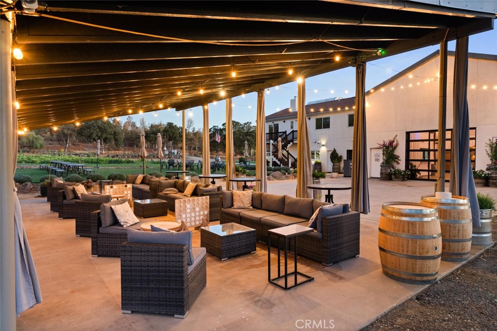 6237 Cohasset Road Chico, CA 95973 - Photo 6 of 73 a outdoor space with patio the couches and dining table with garden view