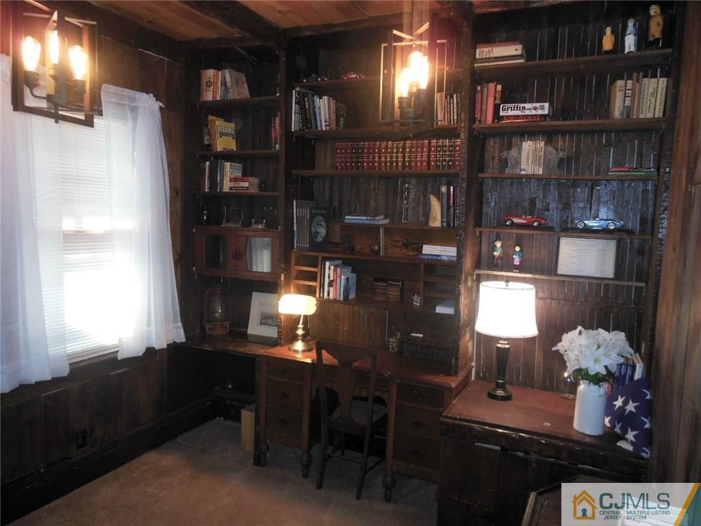 402 Ridge Road Dayton, NJ 08810 - Photo 14 of 25 a room with wine cabinets and a window