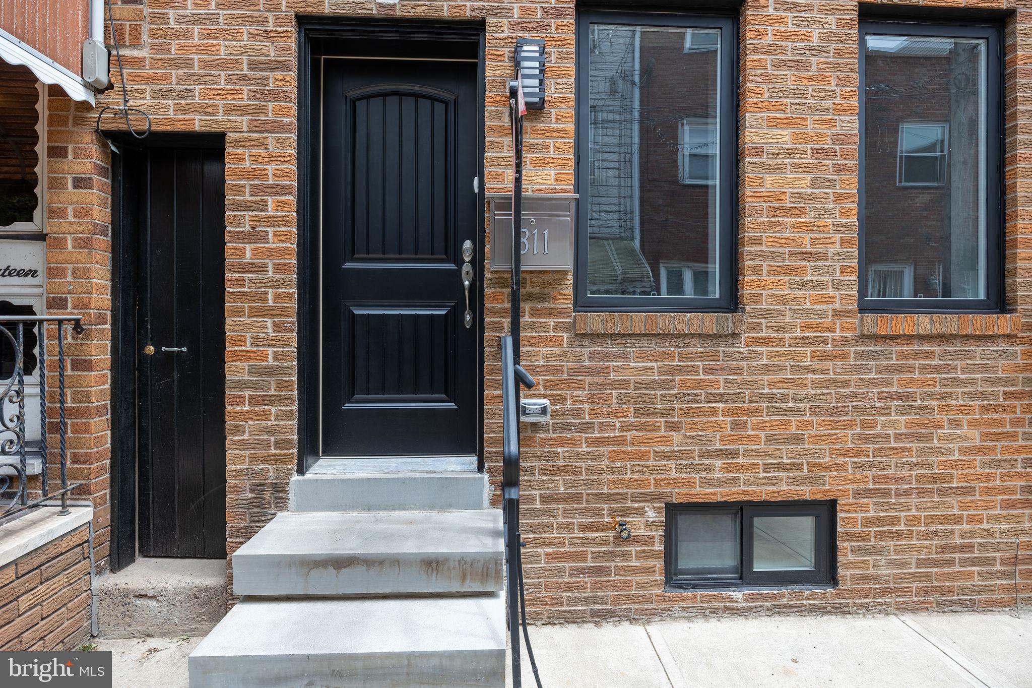 811 Kimball Street Philadelphia, PA 19147 - Photo 1 of 37 a building with a window