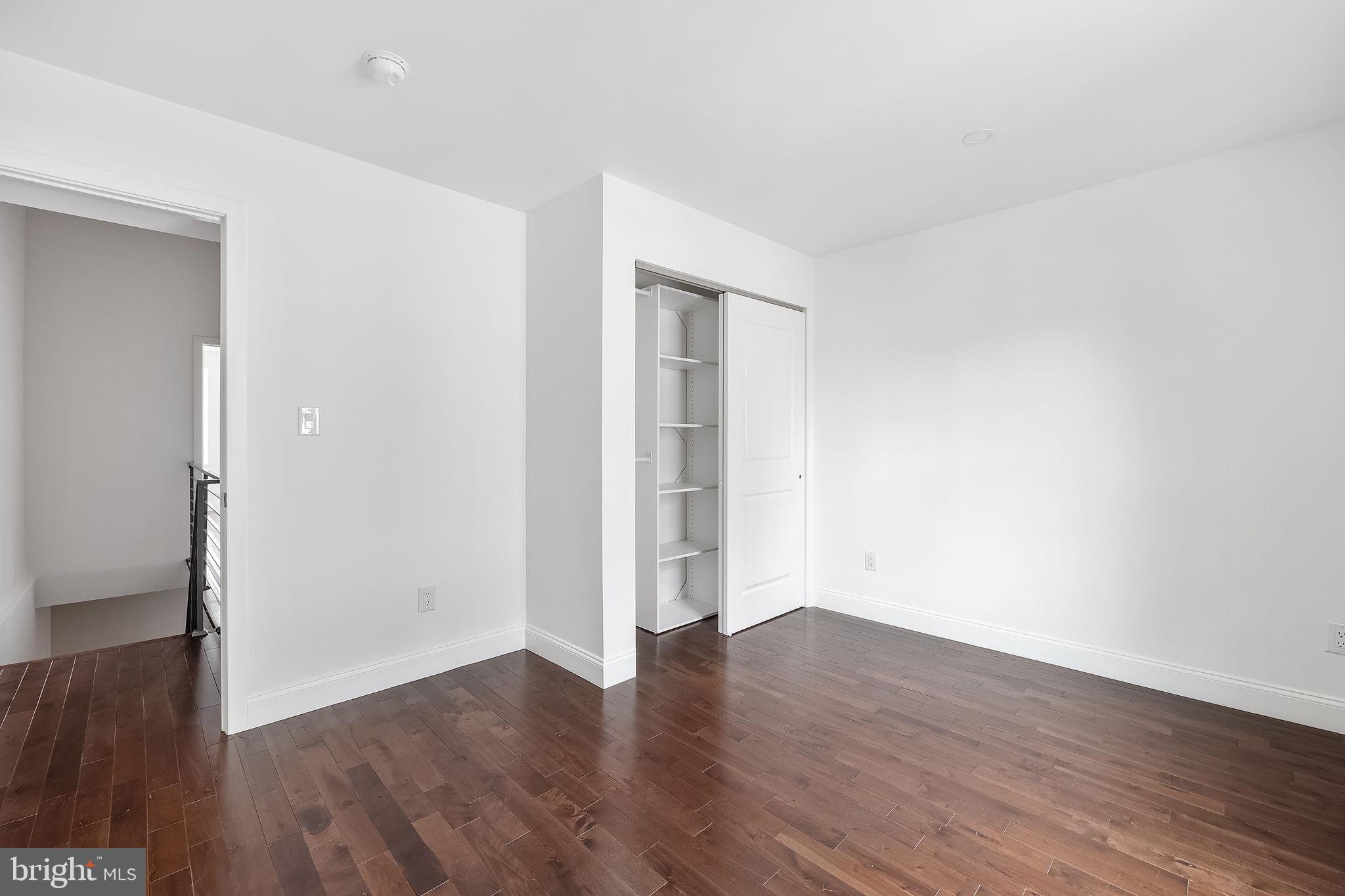 811 Kimball Street Philadelphia, PA 19147 - Photo 25 of 37 a view of an empty room with wooden floor