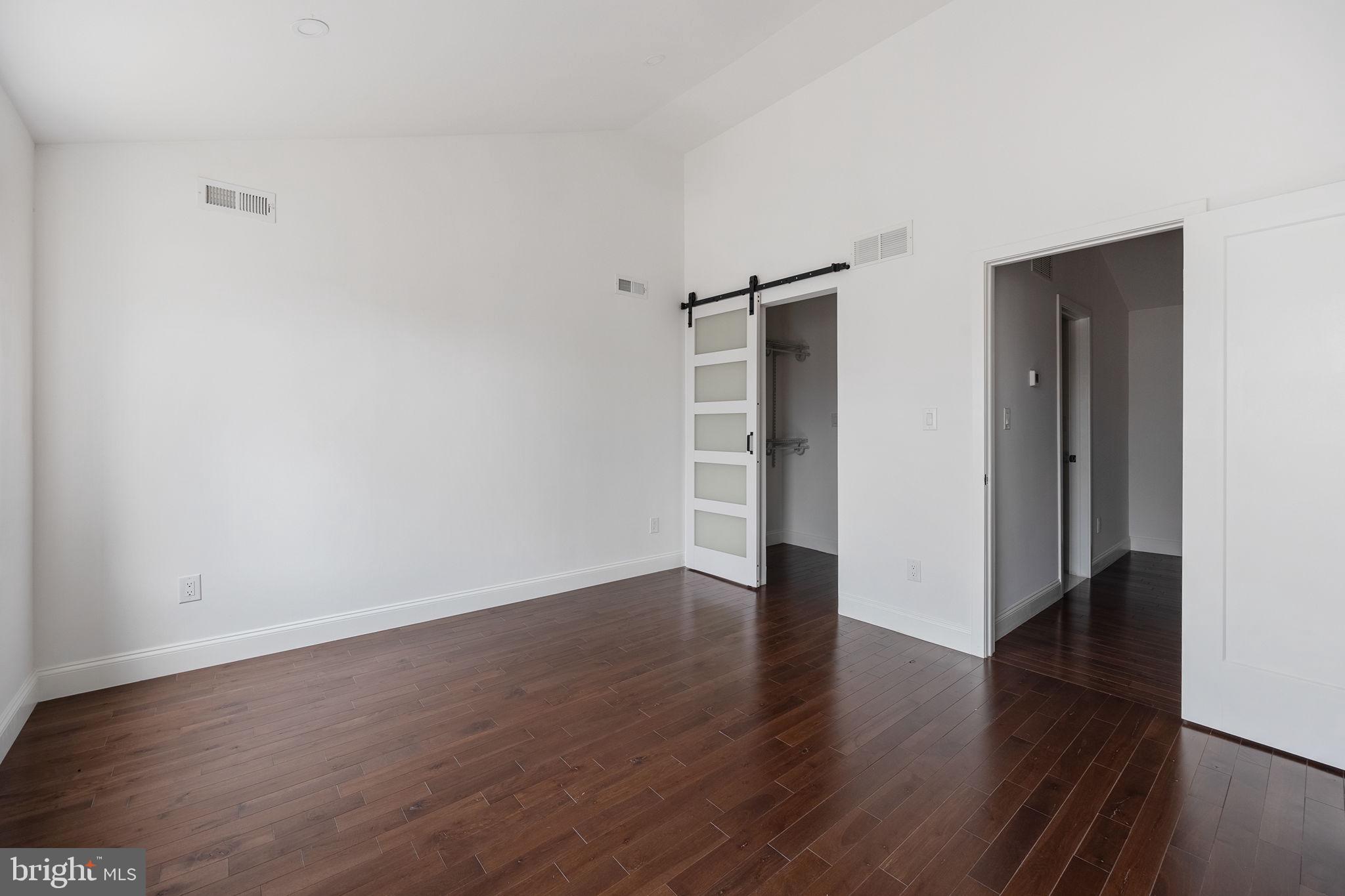 811 Kimball Street Philadelphia, PA 19147 - Photo 28 of 37 a view of an empty room with wooden floor and closet