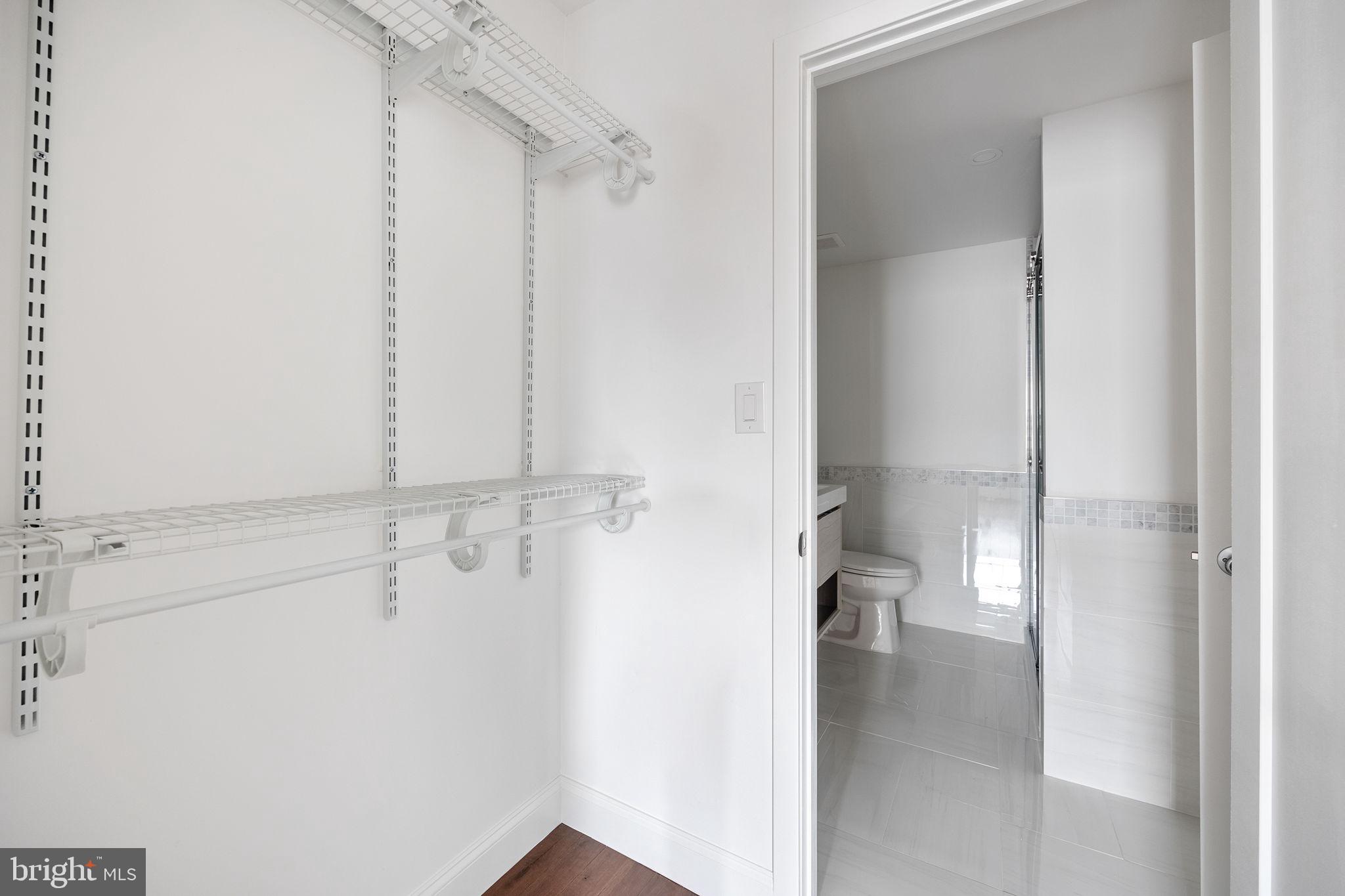 811 Kimball Street Philadelphia, PA 19147 - Photo 30 of 37 a view of walk in closet with empty racks