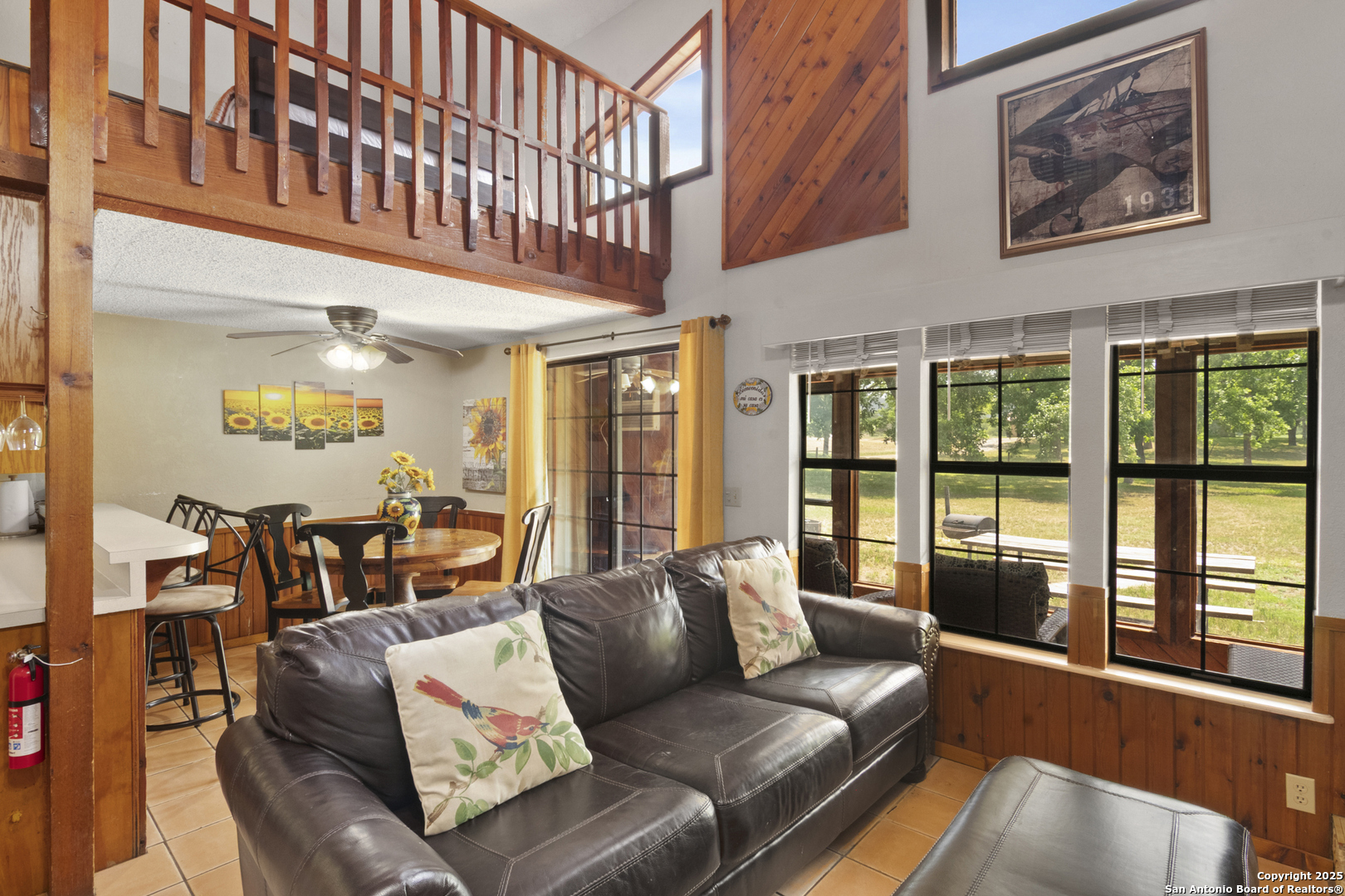 6641 Ranch Road 1120, Unit A B C D Rio Frio, TX 78879 - Photo 14 of 41 a living room with furniture and a large window