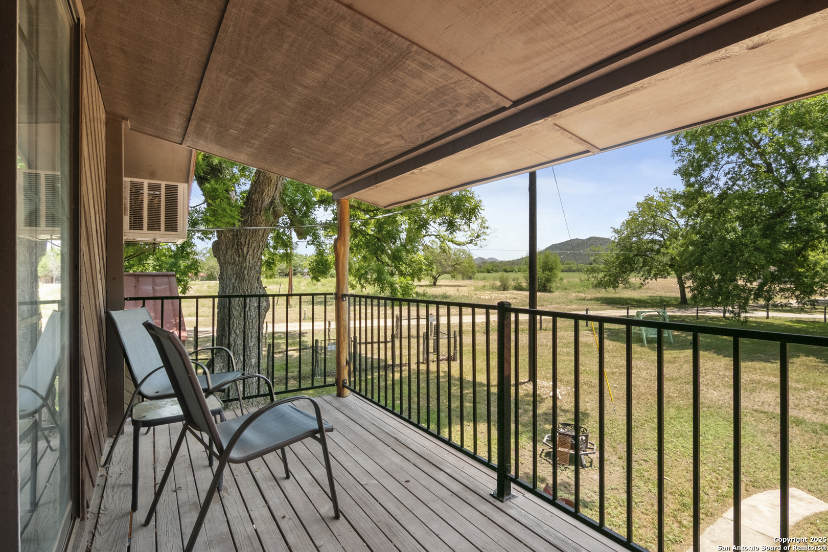 6641 Ranch Road 1120, Unit A B C D Rio Frio, TX 78879 - Photo 17 of 41 a view of balcony with furniture