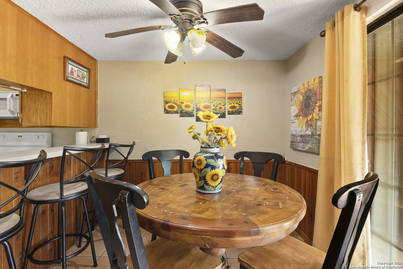 6641 Ranch Road 1120, Unit A B C D Rio Frio, TX 78879 - Photo 17 of 34 a dining room with furniture and chandelier