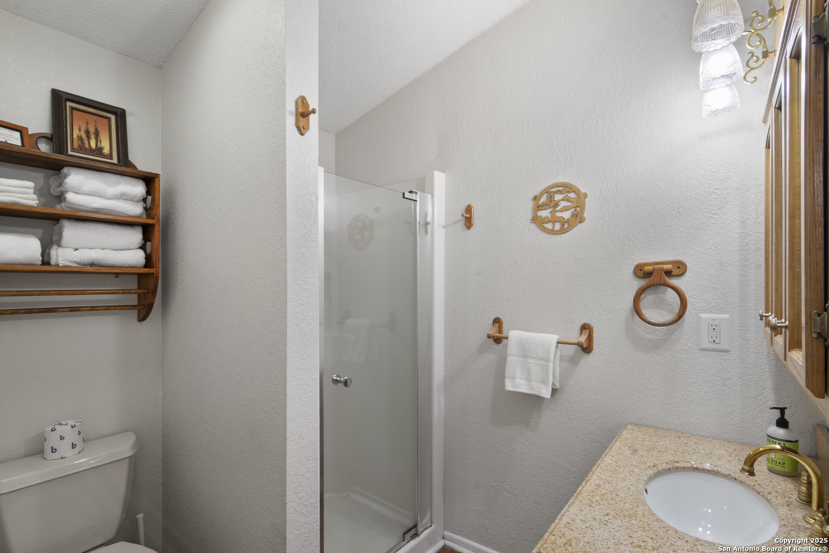 6641 Ranch Road 1120, Unit A B C D Rio Frio, TX 78879 - Photo 23 of 34 a bathroom with a sink and a mirror