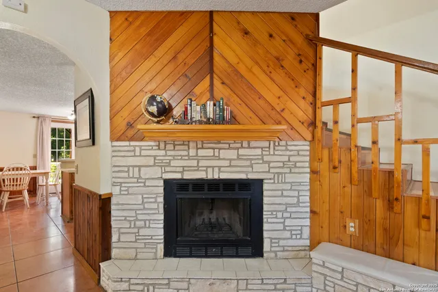 a living room with a fireplace