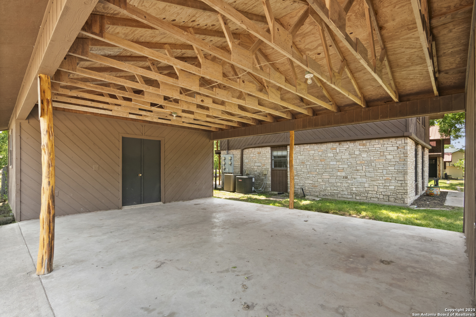 6641 Ranch Road 1120, Unit A B C D Rio Frio, TX 78879 - Photo 32 of 41 a view of a building with a street