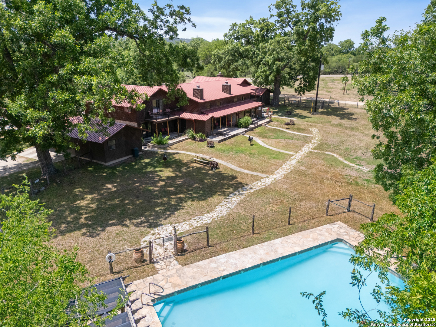 6641 Ranch Road 1120, Unit A B C D Rio Frio, TX 78879 - Photo 33 of 34 swimming pool view with a seating space