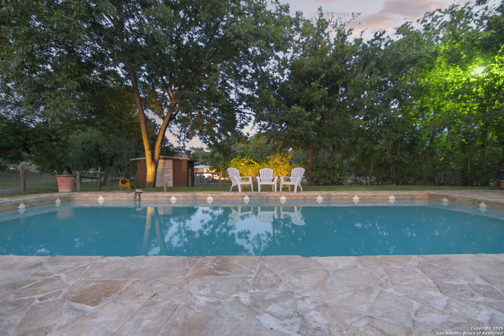 6641 Ranch Road 1120, Unit A B C D Rio Frio, TX 78879 - Photo 33 of 41 a view of swimming pool with a garden