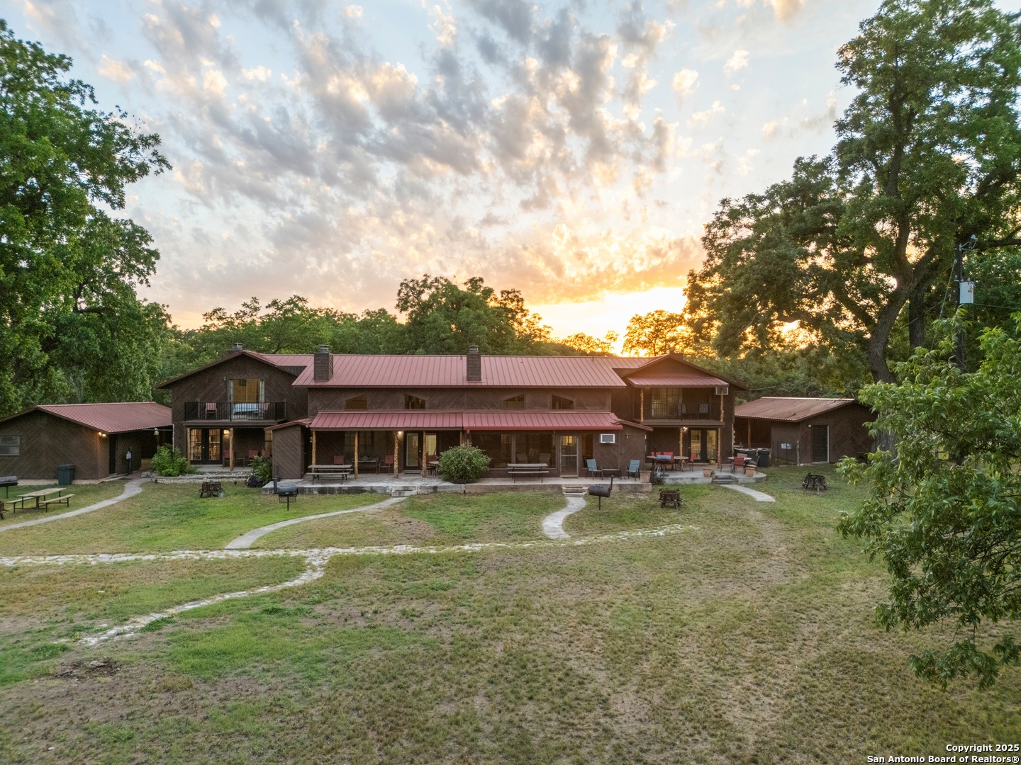 6641 Ranch Road 1120, Unit A B C D Rio Frio, TX 78879 - Photo 36 of 41 a view of a house with garden and sitting area